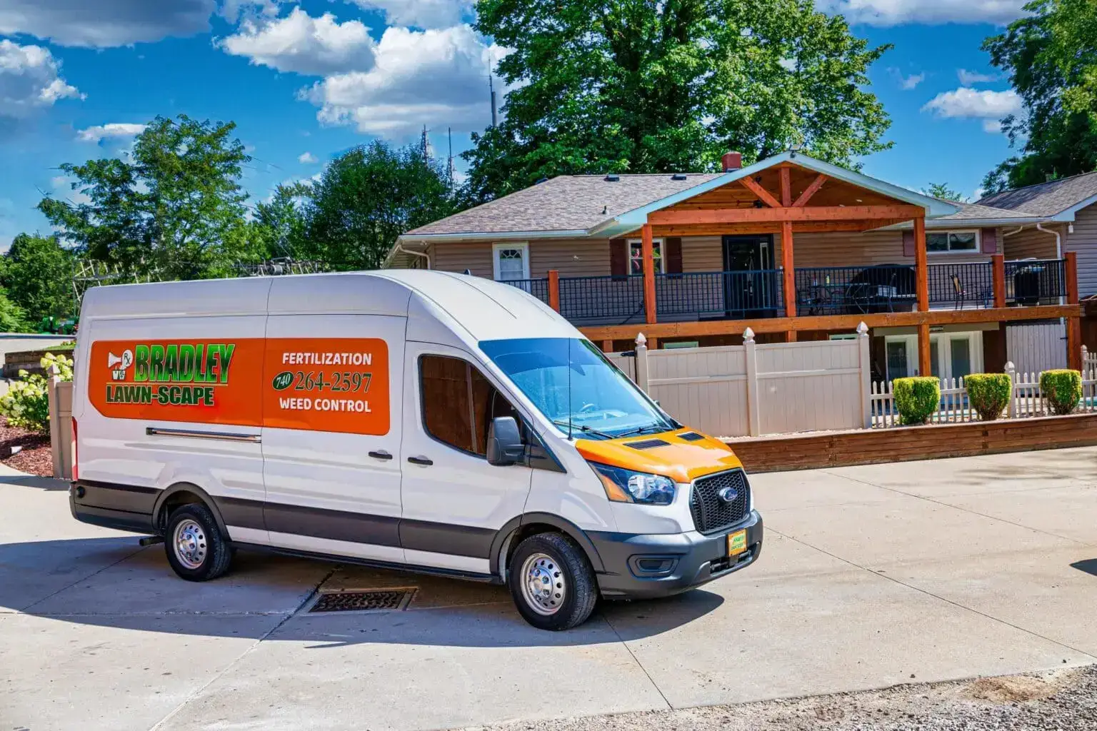 Bradley Lawn-Scape van parked at a property